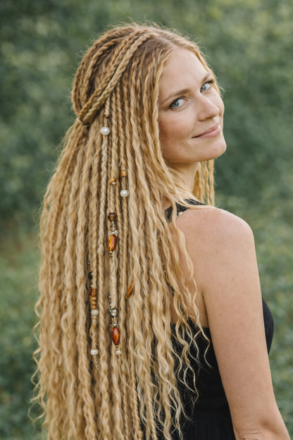 Honey Blonde Dreadlock Extensions with Loose Curls