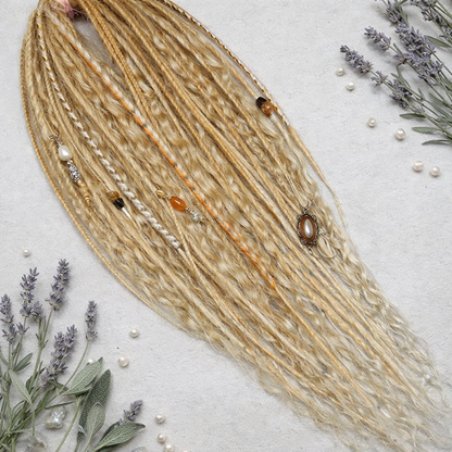 Honey blonde double ended synthetic dreadlocks with loose curls