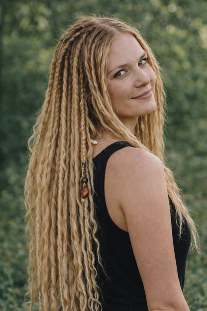 Honey Blonde Dreadlock Extensions with Loose Curls