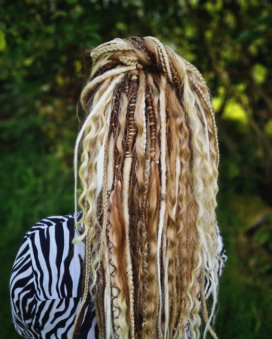 Dirty blonde double ended synthetic dreadlocks with dark and milky blonde and loose curls