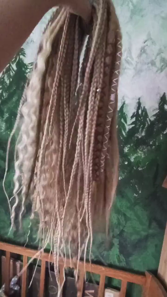 Dirty blonde double ended synthetic dreadlocks with dark and milky blonde and loose curls